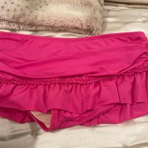Kenneth Cole tankini…flirty skirt bottom. Very flattering very cute.